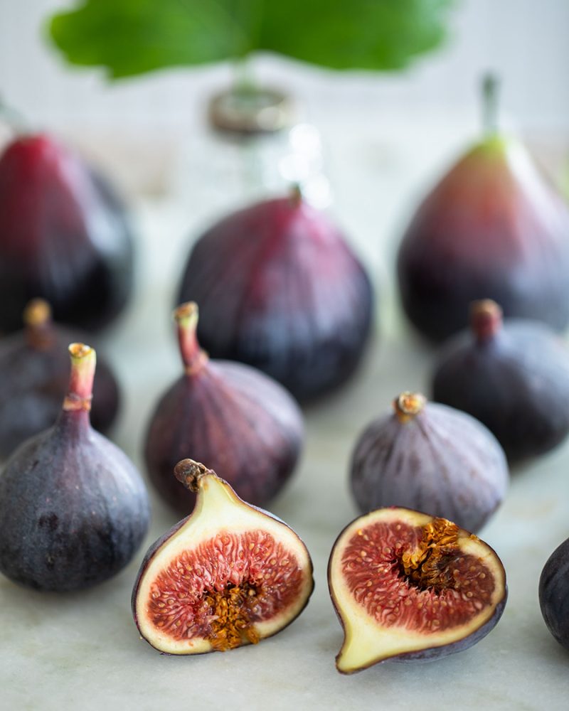 Fresh figs styled naturally with Fig & Vetiver fragrance inspiration