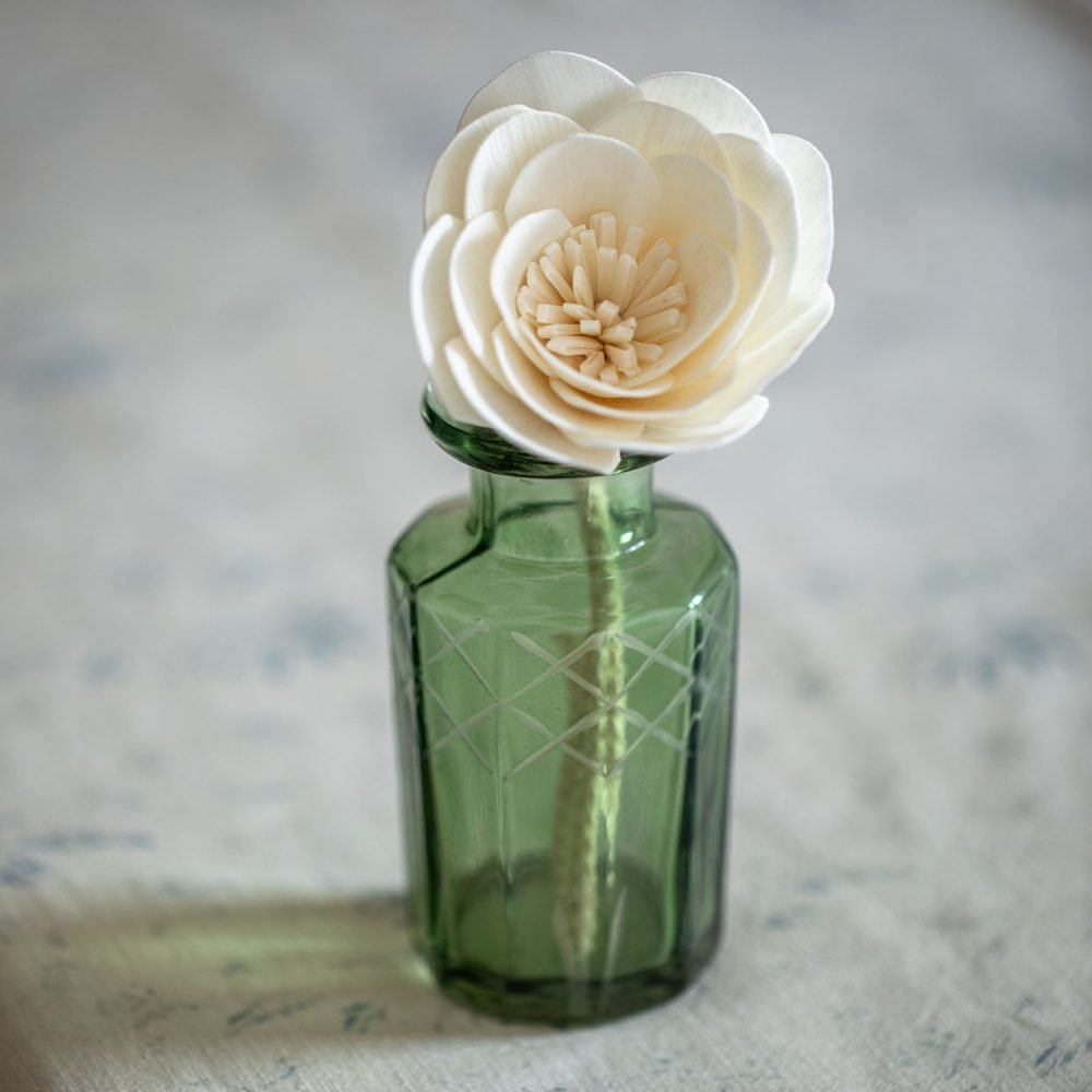 Starflower Diffuser Flower in glass diffuser bottle